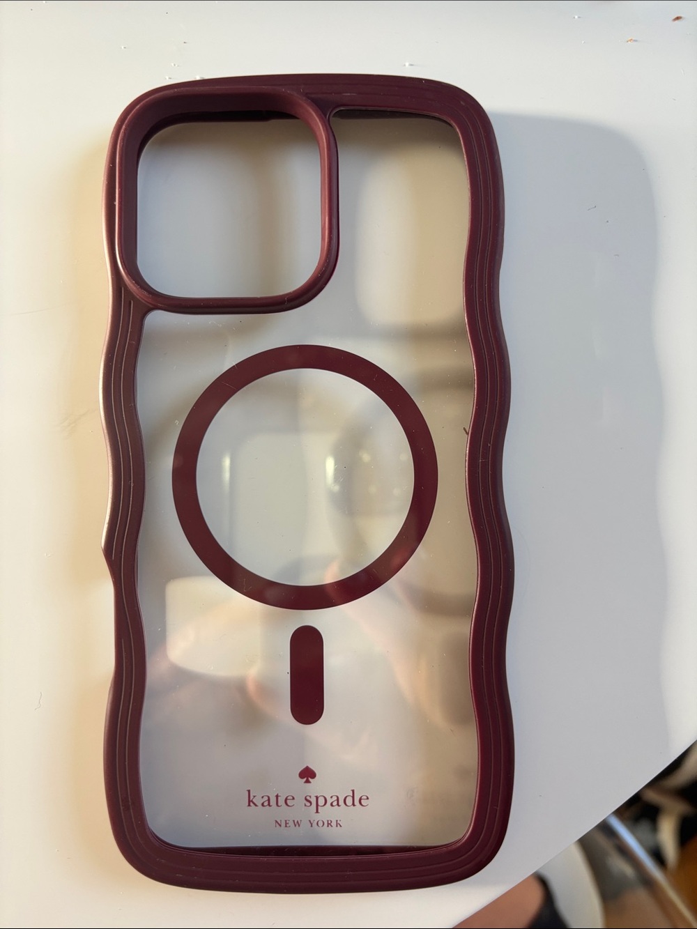kate spade clear iPhone case with burgundy trim and MagSafe ring
